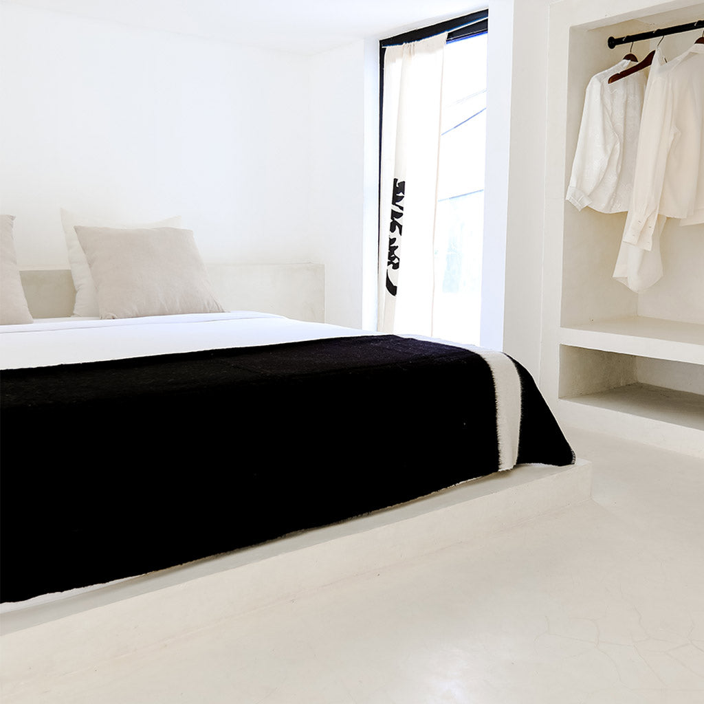 The Siempre Recycled Queen Blanket in Black by Blacksaw